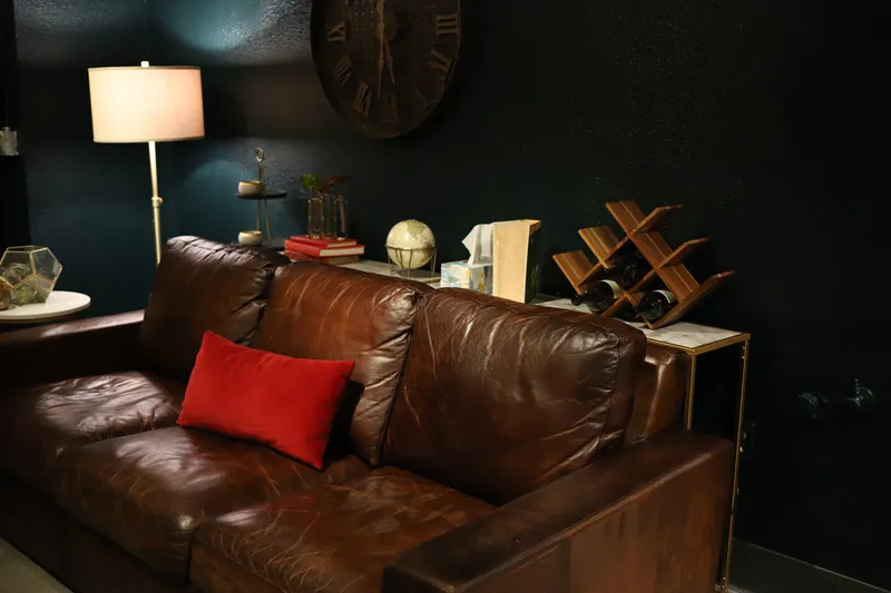 Leather sofa and wine rack in Bella Vino lounge