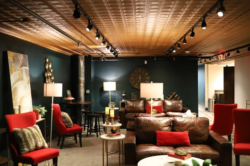 Bella Vino lounge with leather sofas and copper tin ceiling