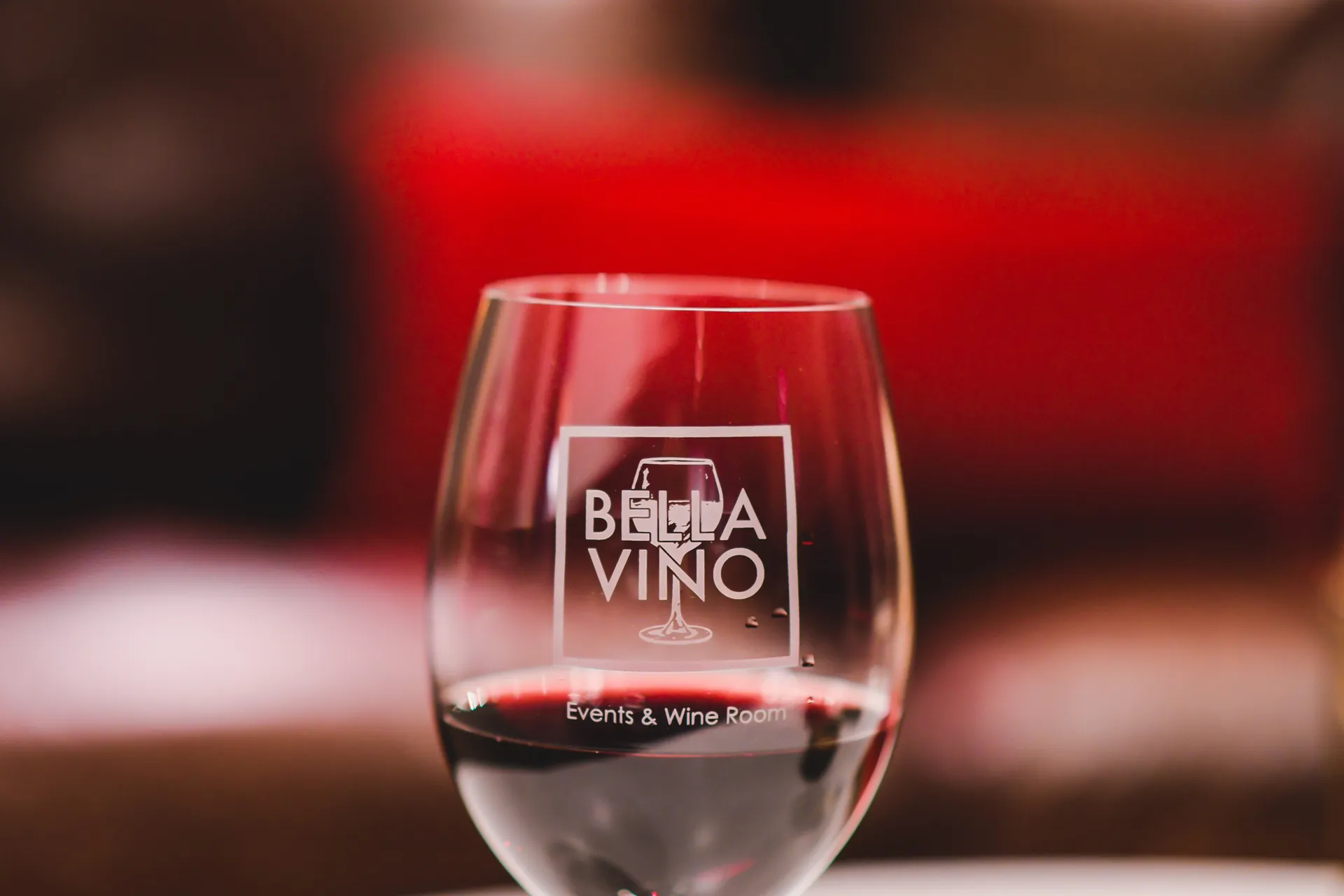 Bella Vino Events branded wine glass in the lounge